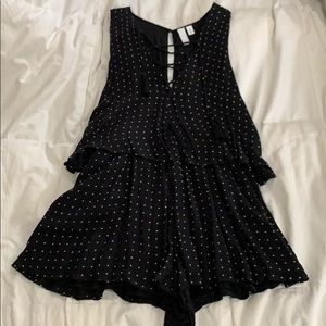 Black and white polka dot romper